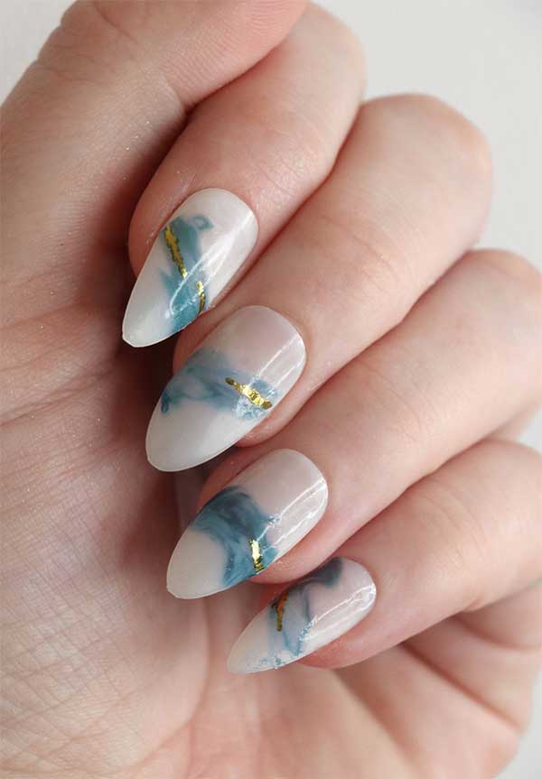 summer nail trends blue watercolor beach